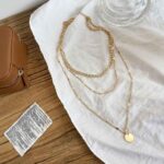 Elegant Three-Layer Gold-Tone Necklace for Modern Women - Image 6