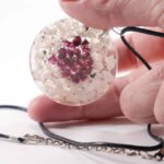 Orgonite Pendant with Selenite, Garnet and Om Symbol - Image 4