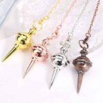 Copper spinning-top style dowsing pendulum